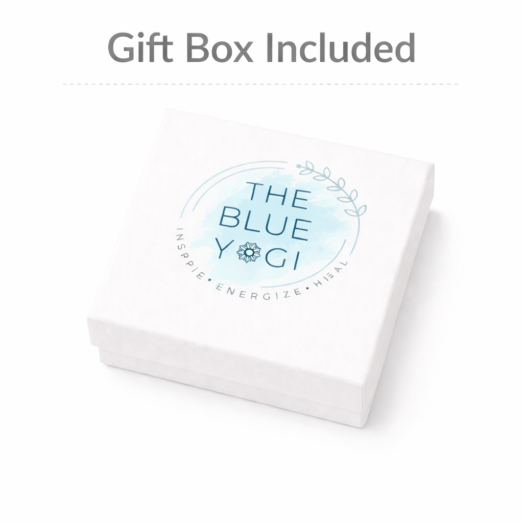 White gift box with 'The Blue Yogi' logo on a white background